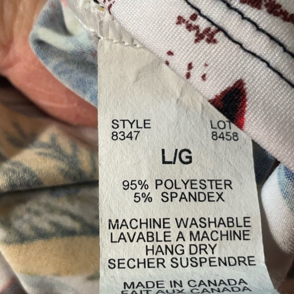 V neck short sleeved shirt in tropical print on a white background. - Picture 6 of 6